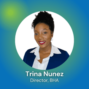A woman with curly hair in a blue blazer and white shirt smiles against a colorful background, identified as Trina Nunez, Director of BHA.